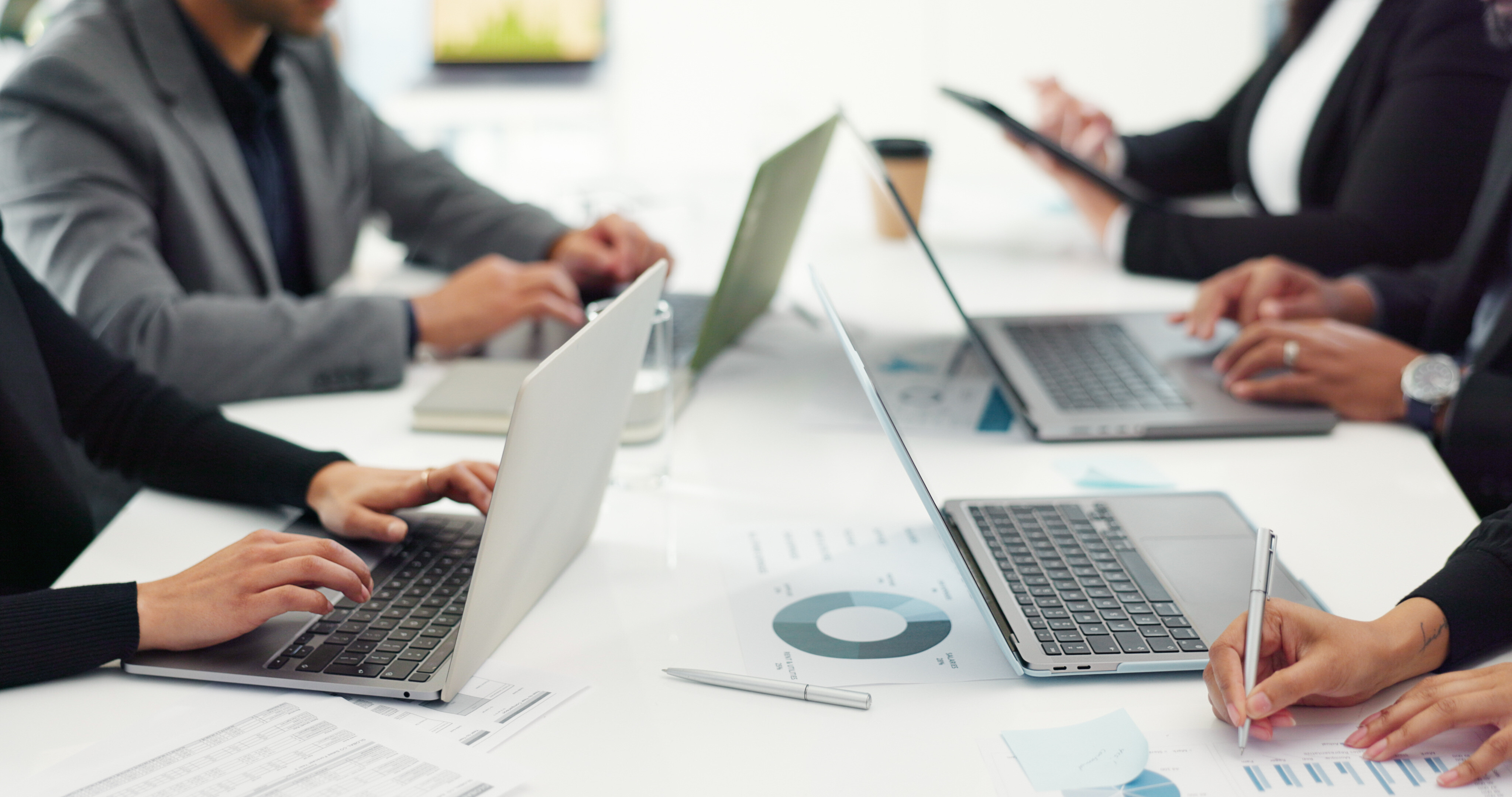 Canadian legal documents and regulatory compliance materials on desk